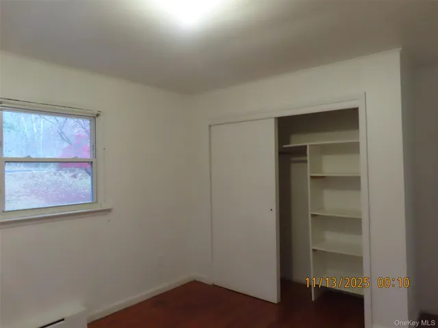 an empty room with a wooden door
