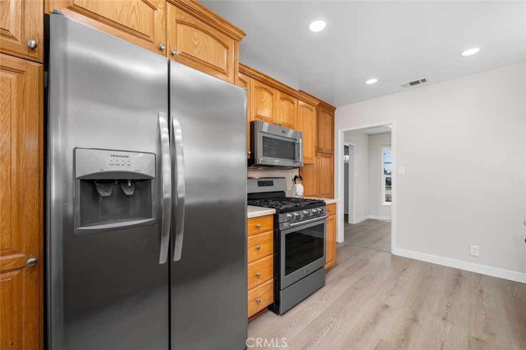 3819 North Studebaker Road Long Beach, CA 90808 - Photo 15 of 62 Side-by-side refrigerator included.