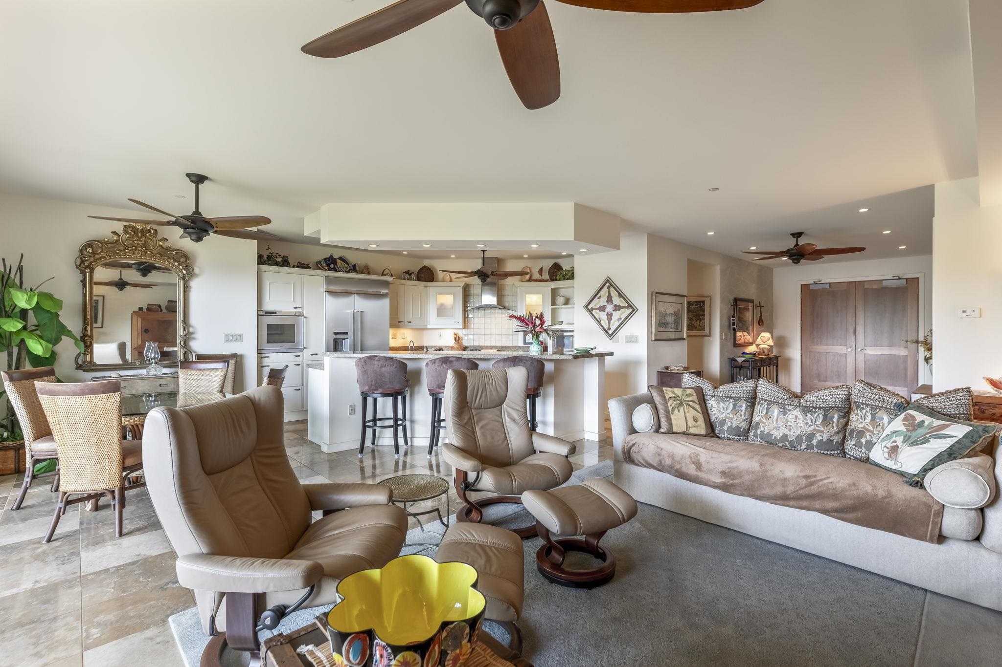 4955 Makena Road, Unit C302 Kihei, HI 96753 - Photo 11 of 37 a view of a livingroom with furniture and a floor to ceiling window