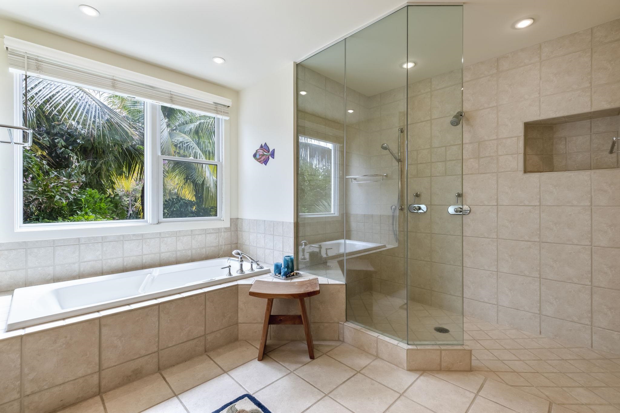 4955 Makena Road, Unit C302 Kihei, HI 96753 - Photo 17 of 37 a bathroom with a large tub shower and sink