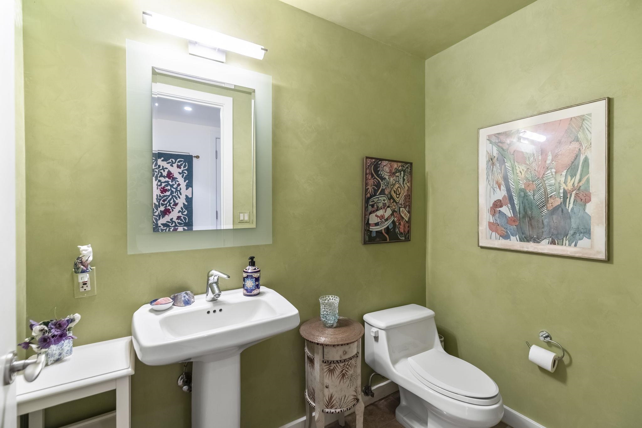 4955 Makena Road, Unit C302 Kihei, HI 96753 - Photo 26 of 37 a bathroom with a toilet sink and mirror
