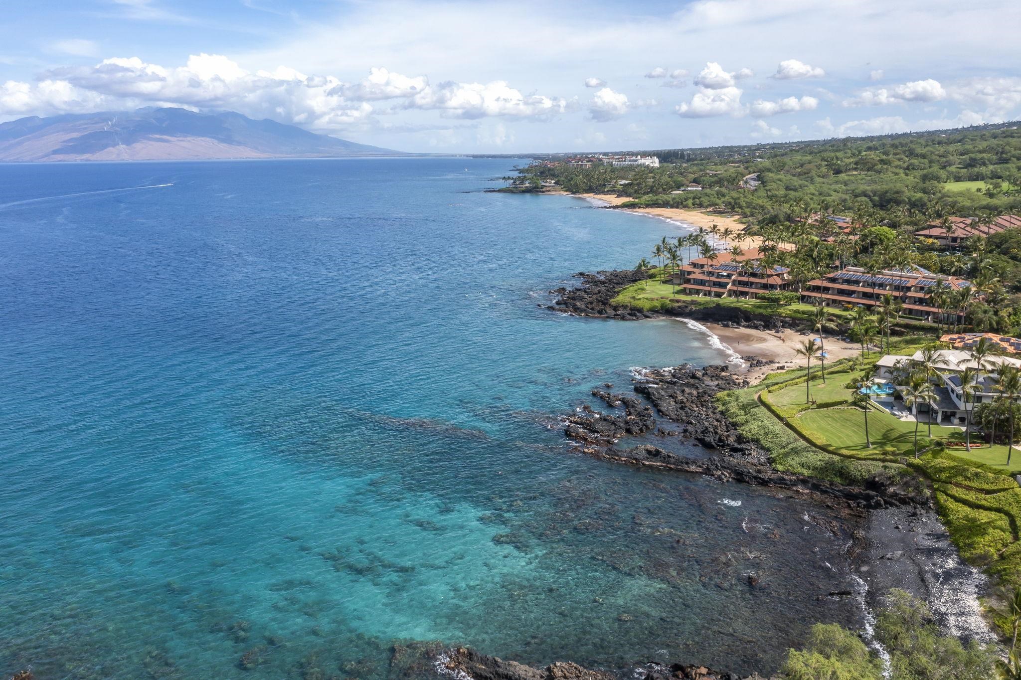 4955 Makena Road, Unit C302 Kihei, HI 96753 - Photo 27 of 37 a view of a yard with an ocean view
