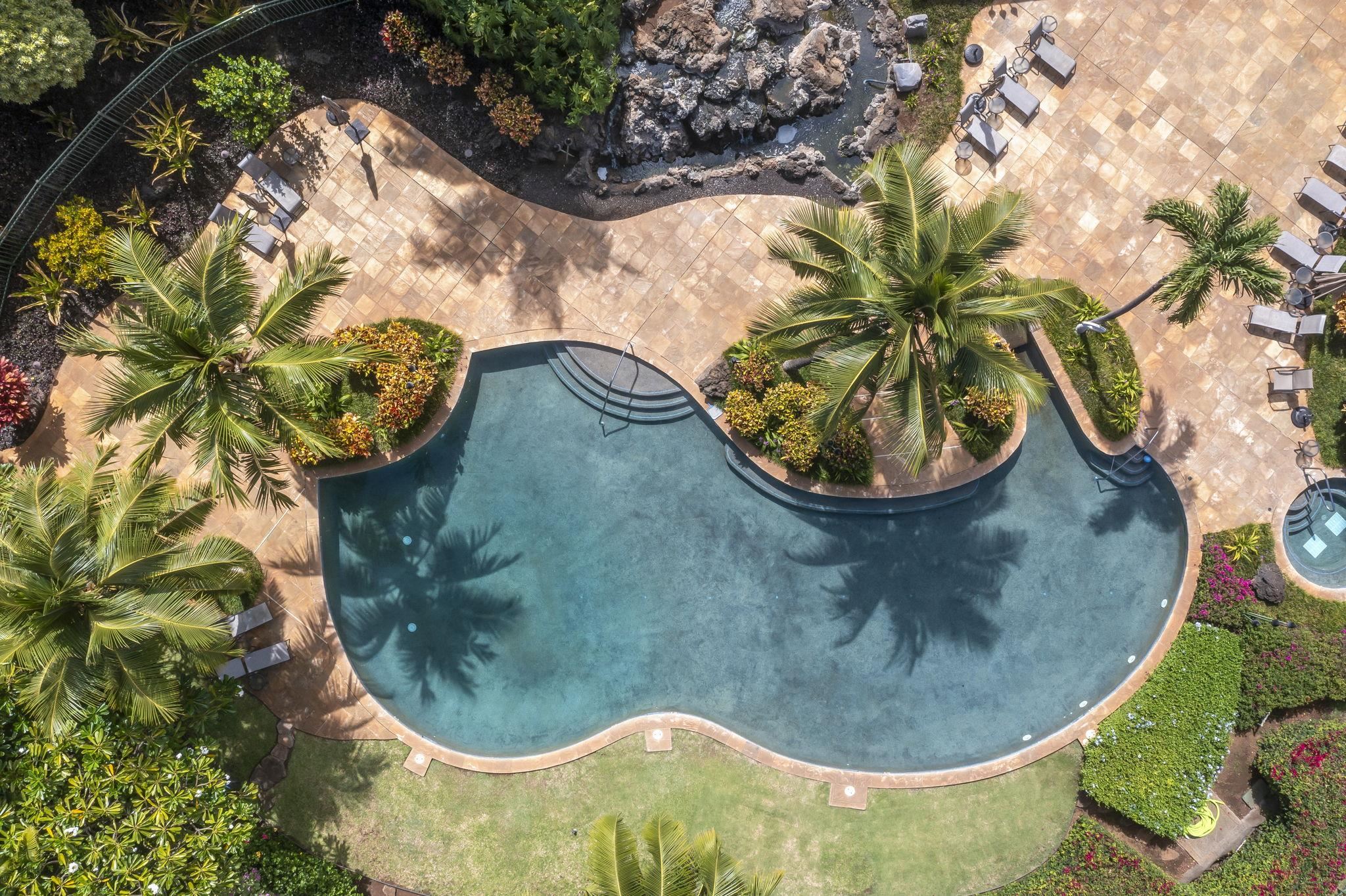 4955 Makena Road, Unit C302 Kihei, HI 96753 - Photo 29 of 37 an aerial view of a swimming pool