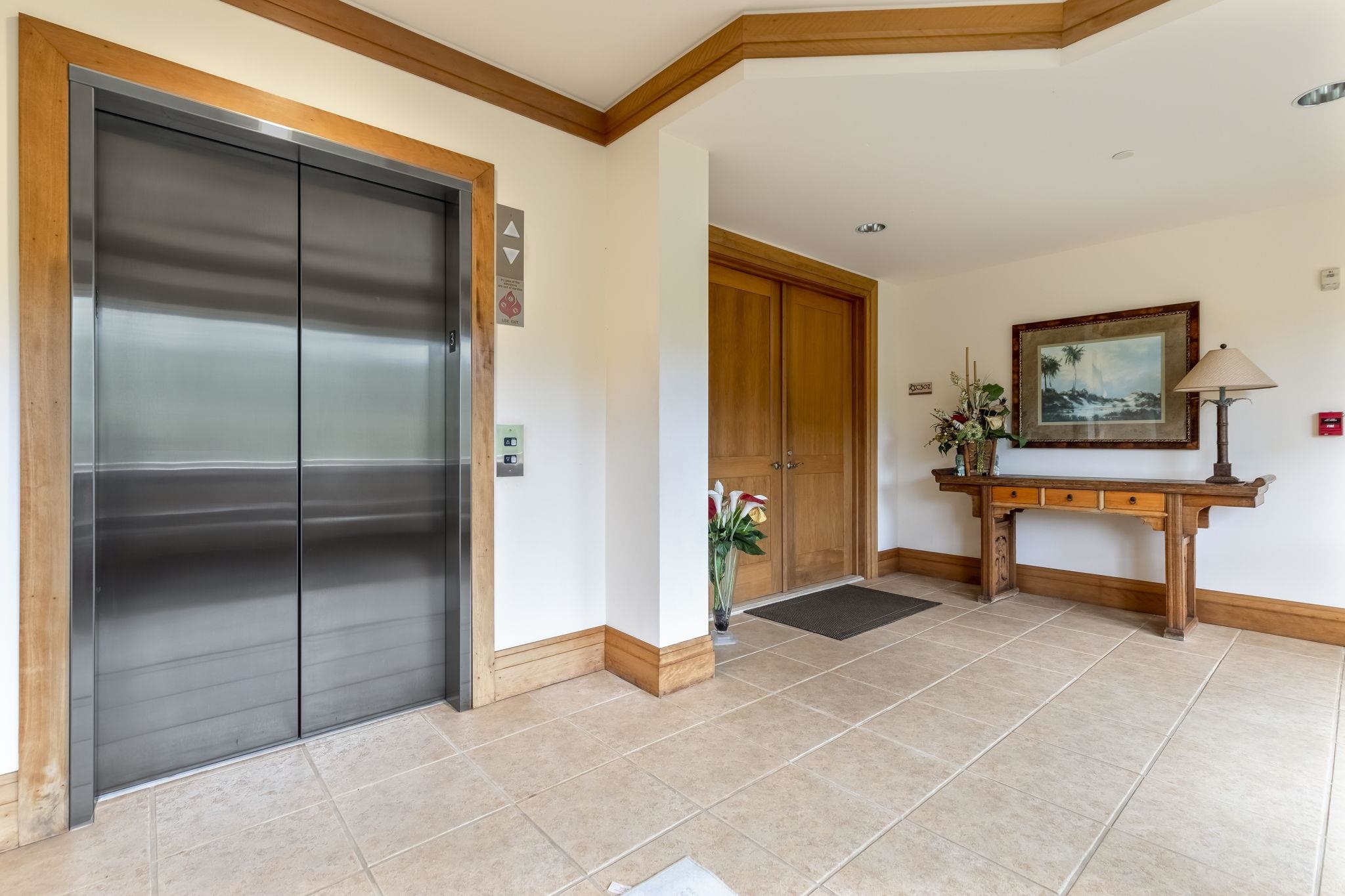 4955 Makena Road, Unit C302 Kihei, HI 96753 - Photo 30 of 37 a room with sliding door and natural light