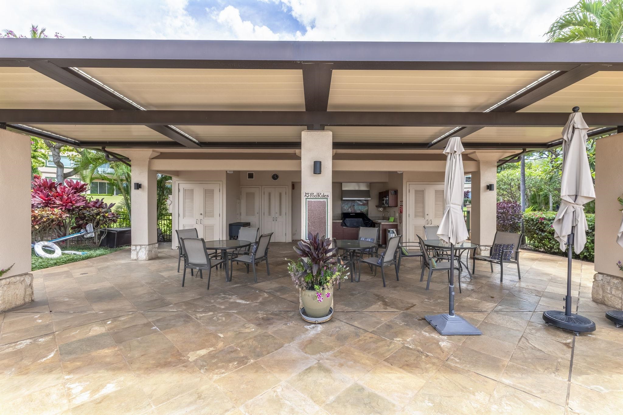 4955 Makena Road, Unit C302 Kihei, HI 96753 - Photo 33 of 37 a view of a porch with a table and chairs