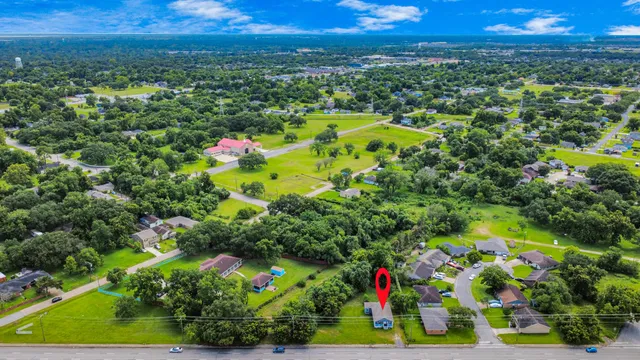 a view of swimming pool with a yard