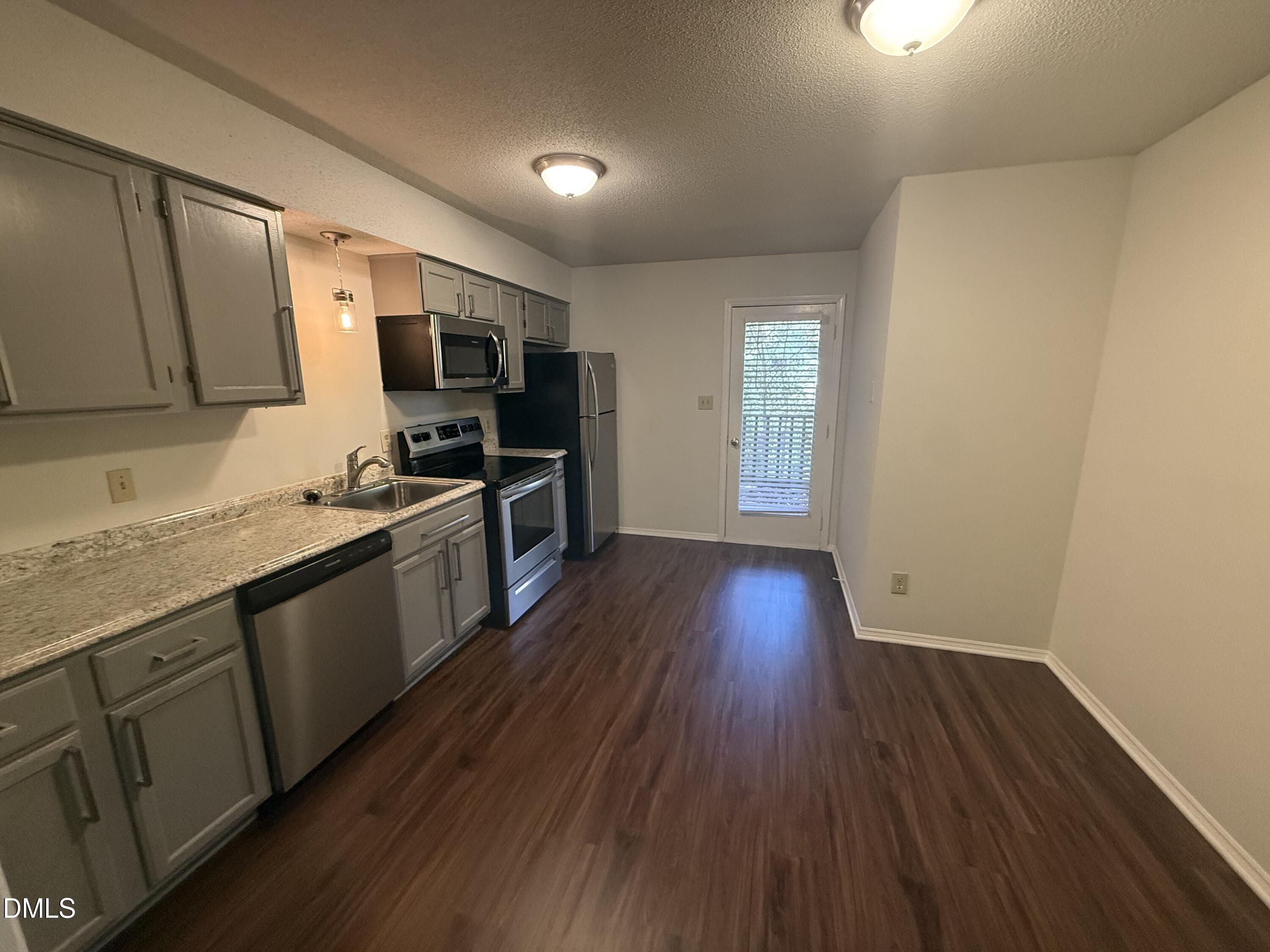 3021 Medlin Drive, Unit C Raleigh, NC 27607 - Photo 5 of 15 IMG_8447