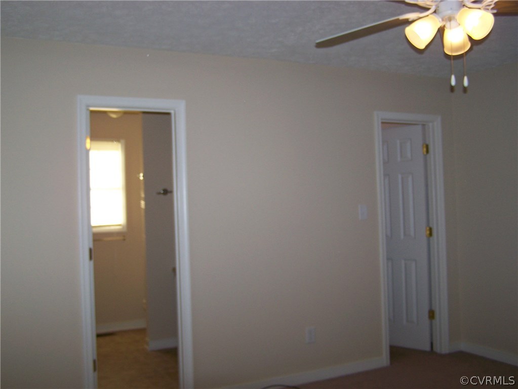 22538 Cabin Point Road Disputanta, VA 23842 - Photo 11 of 18 Mater Bedroom to Master Bath and Walk in Closet