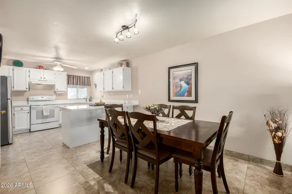 a view of a dining room with furniture