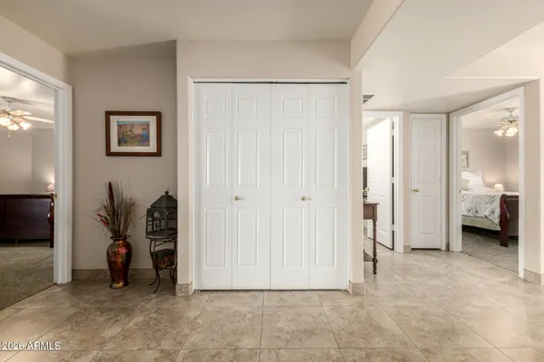 a view of a livingroom with furniture and closet