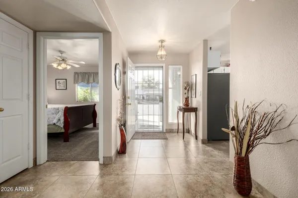 a bathroom with a tub and shower