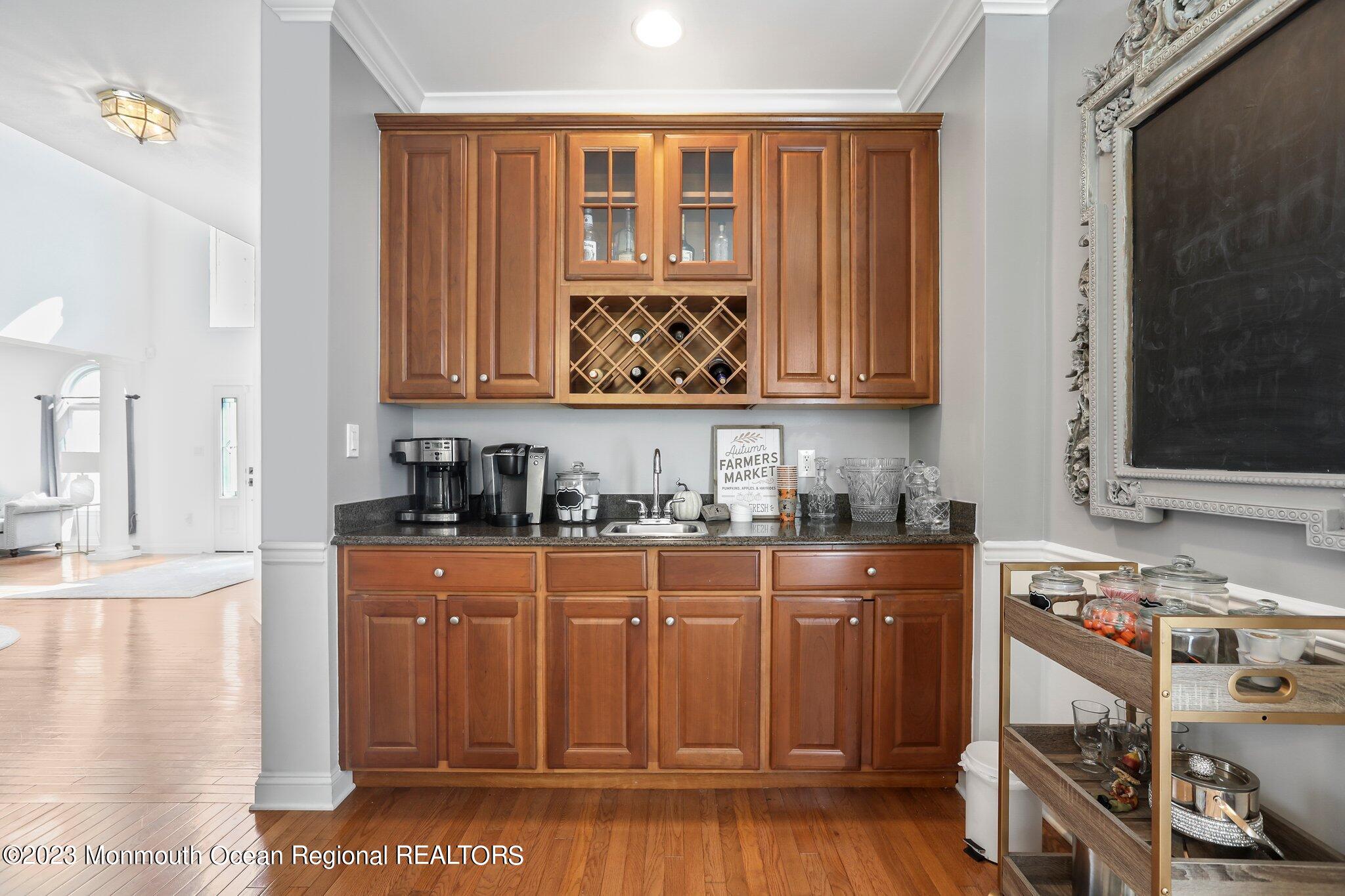 2 Wilson Boulevard Jackson, NJ 08527 - Photo 11 of 41 a kitchen with stainless steel appliances granite countertop a stove a sink and a microwave