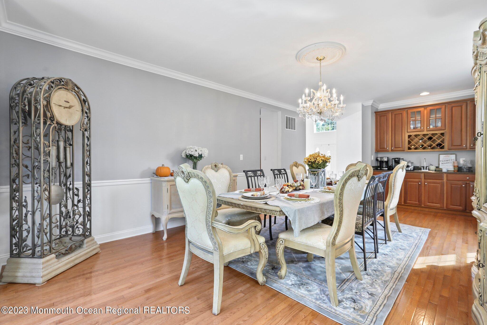 2 Wilson Boulevard Jackson, NJ 08527 - Photo 12 of 41 a view of a dining room with furniture a chandelier and wooden floor