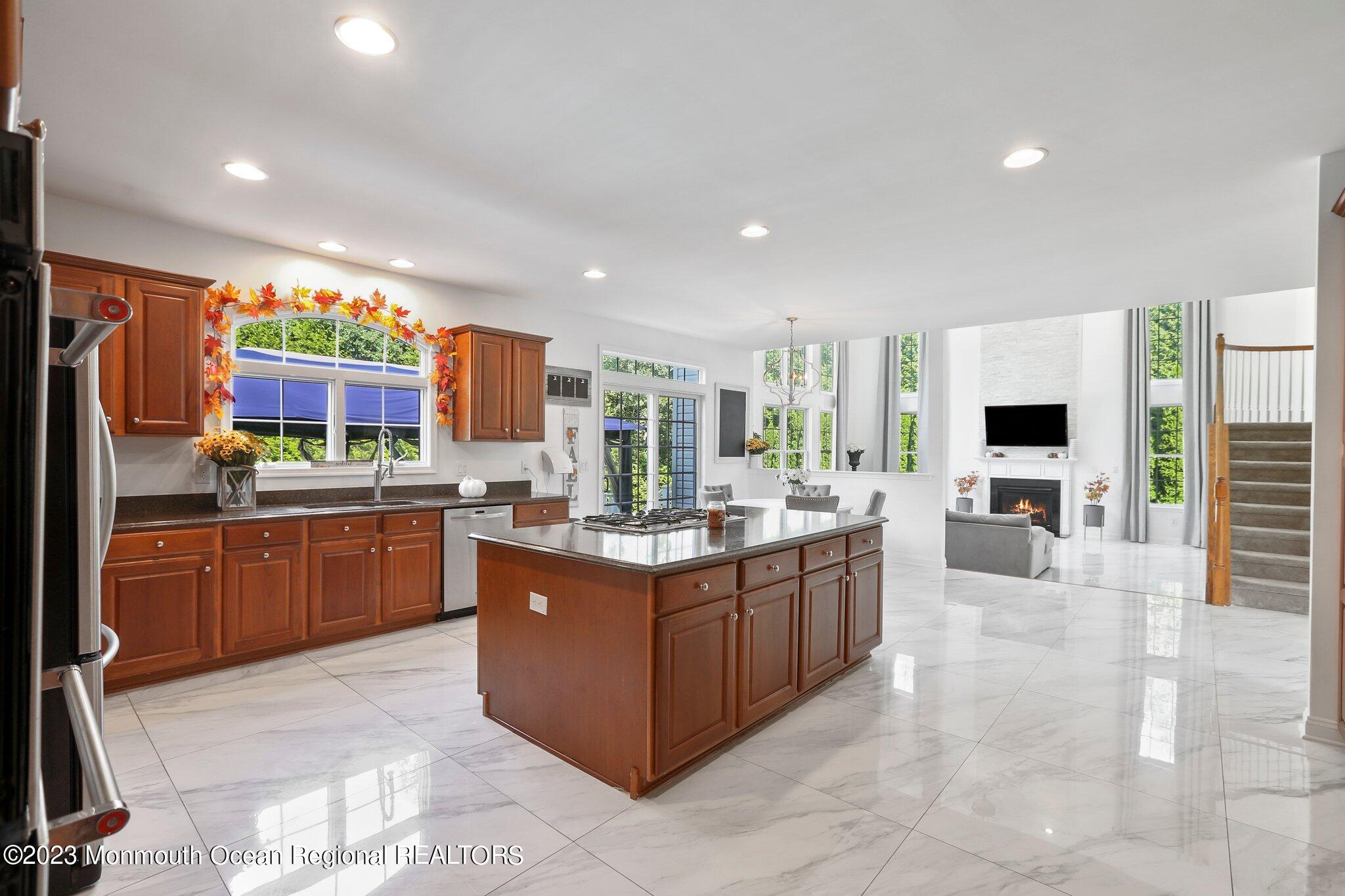 2 Wilson Boulevard Jackson, NJ 08527 - Photo 13 of 41 a kitchen with stainless steel appliances granite countertop a stove and a refrigerator