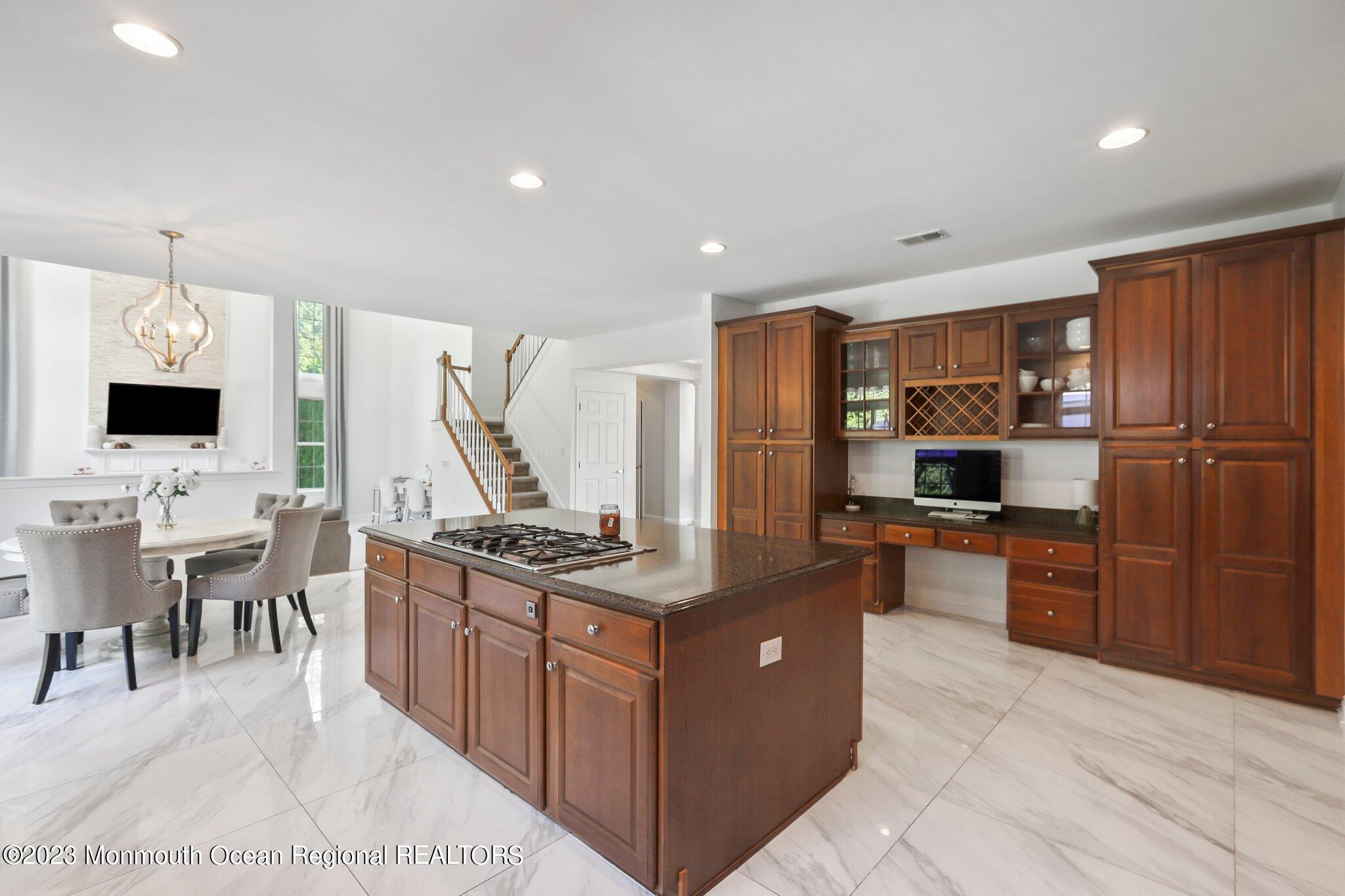2 Wilson Boulevard Jackson, NJ 08527 - Photo 16 of 41 a kitchen with stainless steel appliances granite countertop a stove oven and a refrigerator