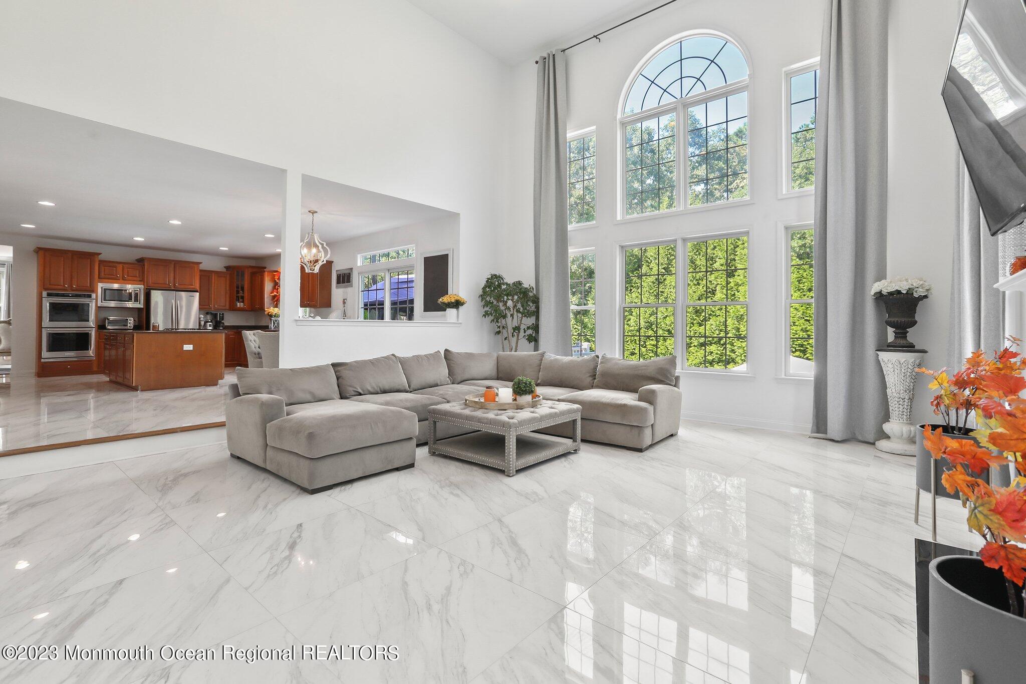 2 Wilson Boulevard Jackson, NJ 08527 - Photo 19 of 41 a living room with furniture and a large window