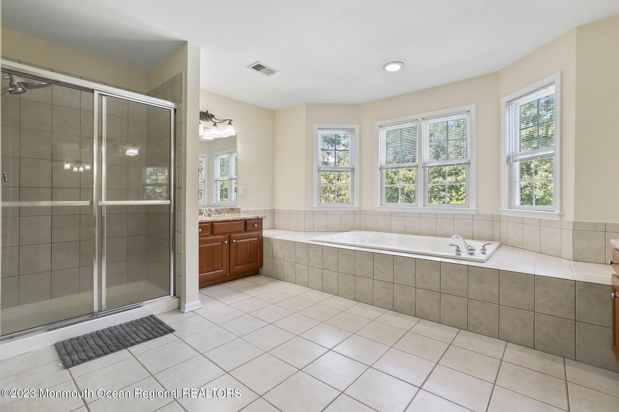 2 Wilson Boulevard Jackson, NJ 08527 - Photo 26 of 41 a spacious bathroom with a tub shower and sink