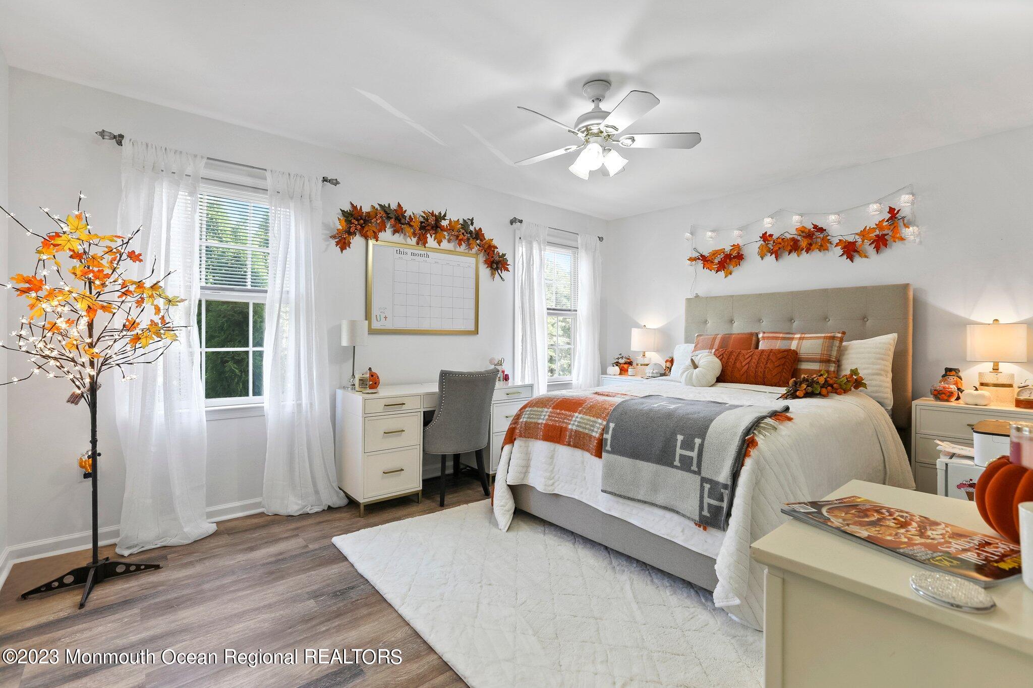 2 Wilson Boulevard Jackson, NJ 08527 - Photo 30 of 41 a bedroom with furniture and a chandelier