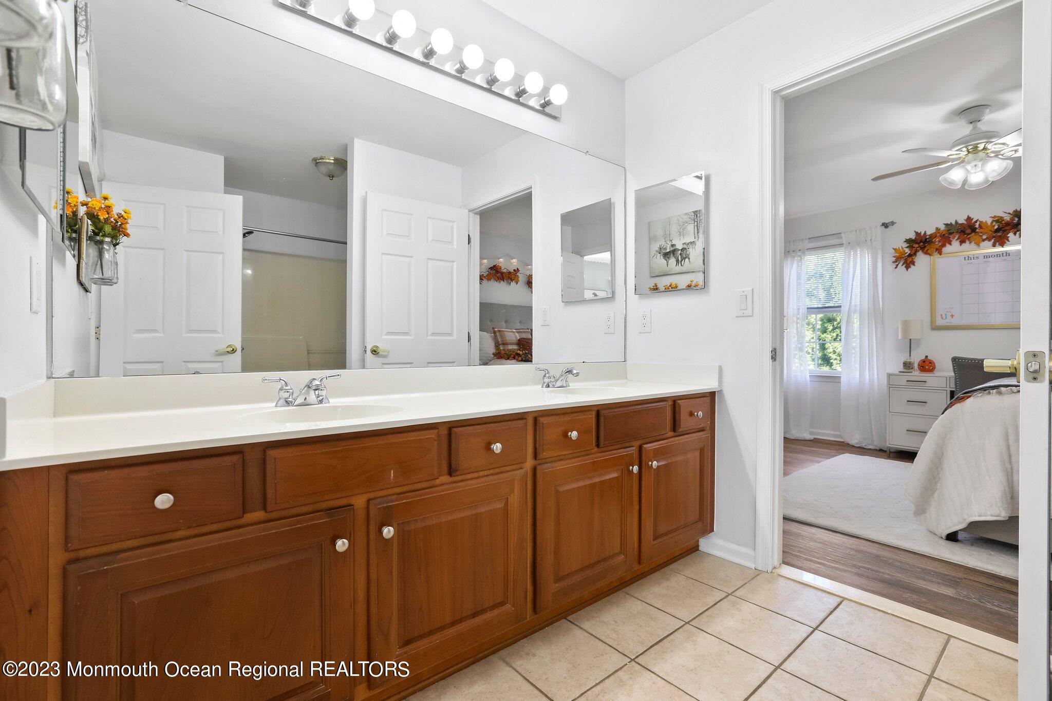 2 Wilson Boulevard Jackson, NJ 08527 - Photo 31 of 41 a spacious bathroom with a double vanity sink mirror and
