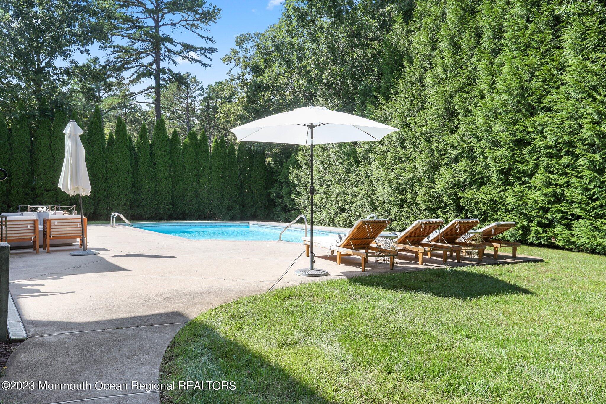 2 Wilson Boulevard Jackson, NJ 08527 - Photo 37 of 41 a backyard of a house with table and chairs