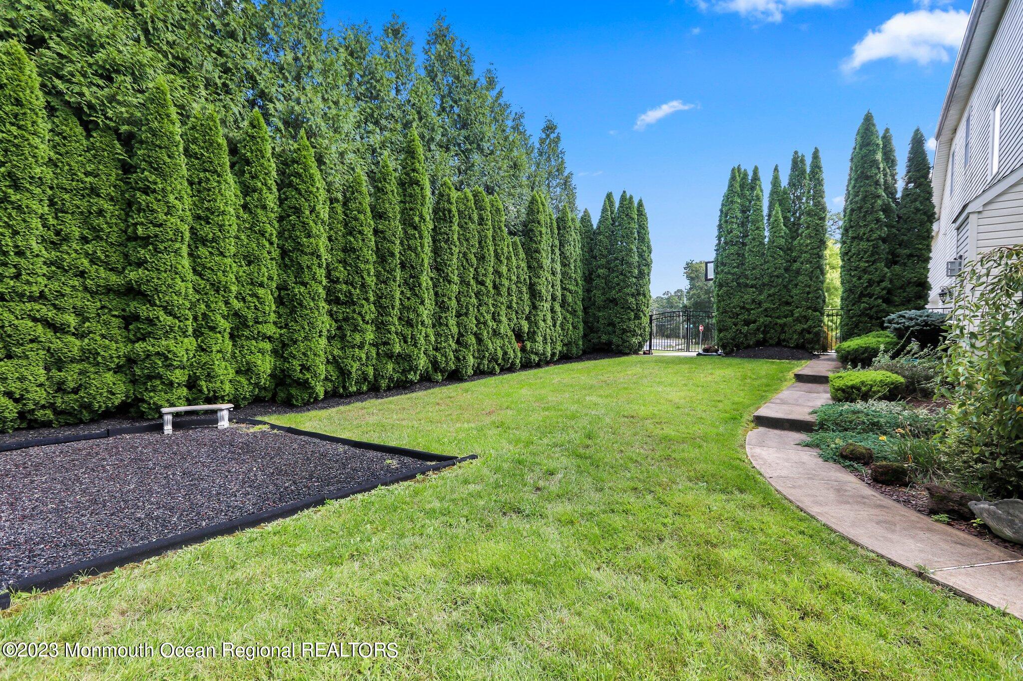 2 Wilson Boulevard Jackson, NJ 08527 - Photo 39 of 41 a view of a yard with palm trees