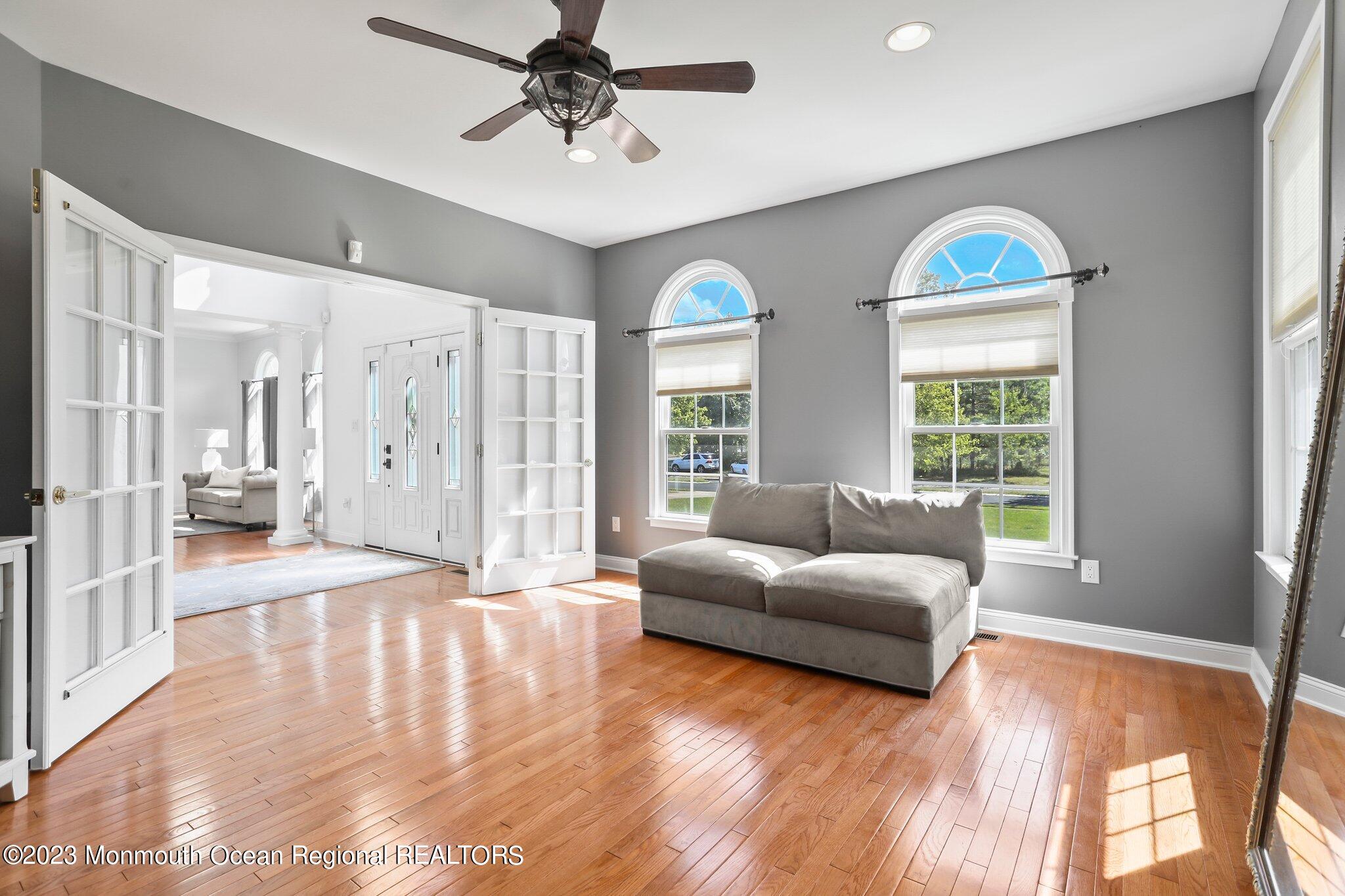 2 Wilson Boulevard Jackson, NJ 08527 - Photo 8 of 41 a living room with furniture and a large window