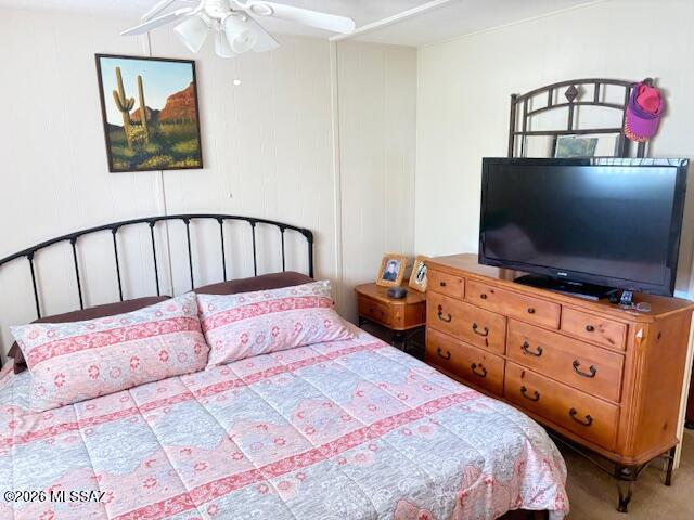 5731 West Flying M Street Tucson, AZ 85713 - Photo 15 of 20 a bedroom with a bed and a flat screen tv