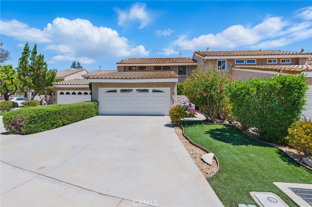 4424 Park Jazmin Calabasas, CA 91302 - Photo 1 of 1 a front view of a house with a yard and garage