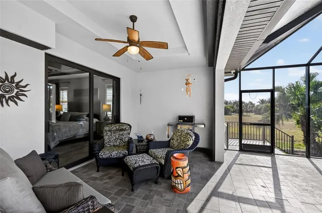 a view of a swimming pool with a patio
