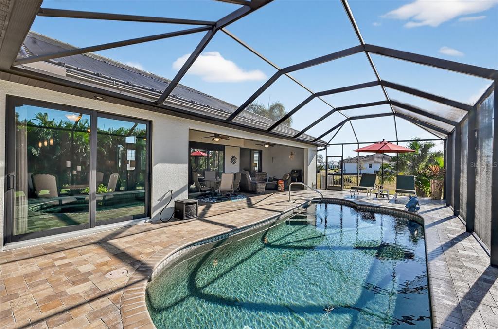 8 Windward Road Placida, FL 33946 - Photo 36 of 47 a view of a swimming pool with a patio