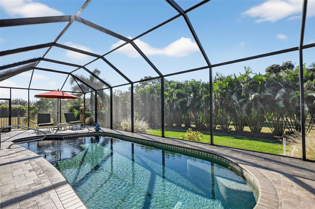 8 Windward Road Placida, FL 33946 - Photo 37 of 47 a view of swimming pool with a patio