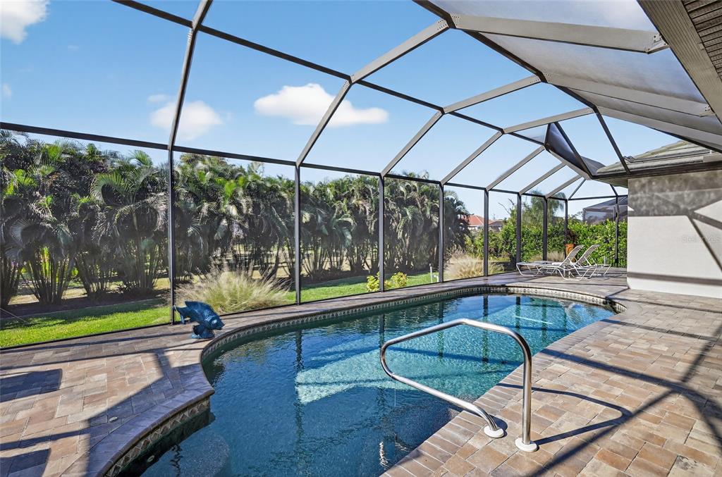 8 Windward Road Placida, FL 33946 - Photo 38 of 47 a swimming pool with outdoor seating