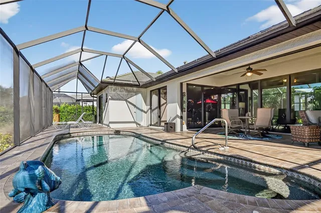 a reading room with furniture and a window