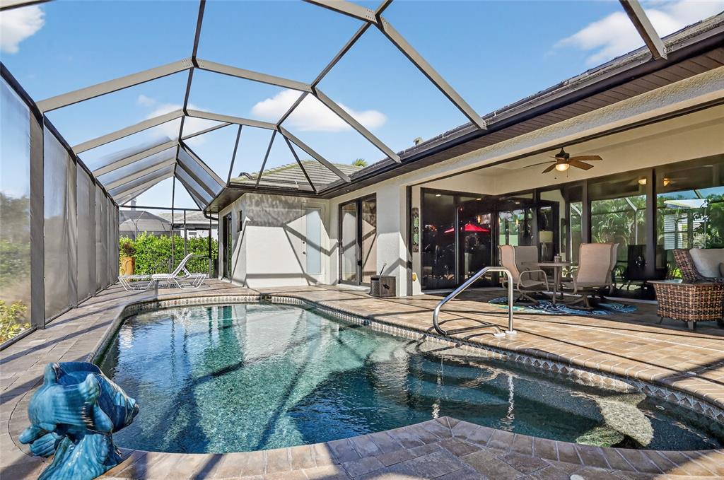8 Windward Road Placida, FL 33946 - Photo 39 of 47 a view of a swimming pool with a patio