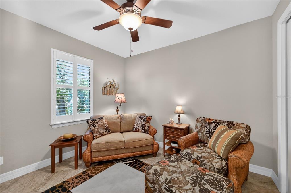 8 Windward Road Placida, FL 33946 - Photo 41 of 47 a living room with furniture and a window