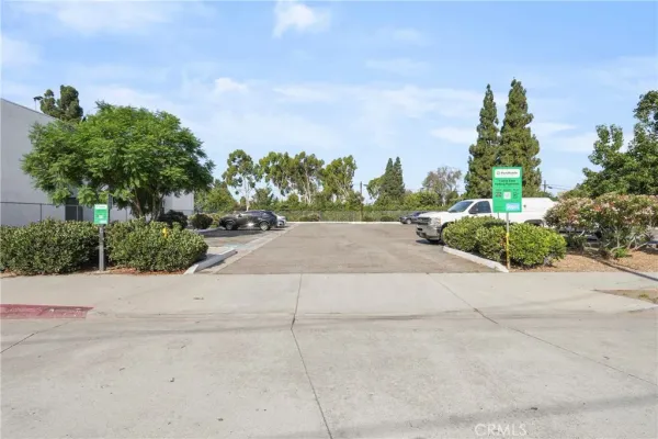 a view of road with a building in the background