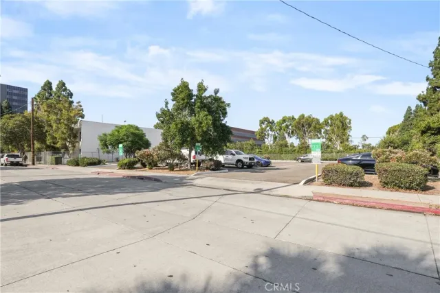 a view of a street with houses