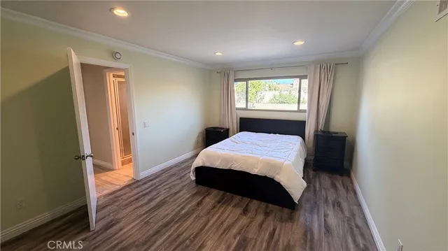 a view of a swimming pool with a lounge chair