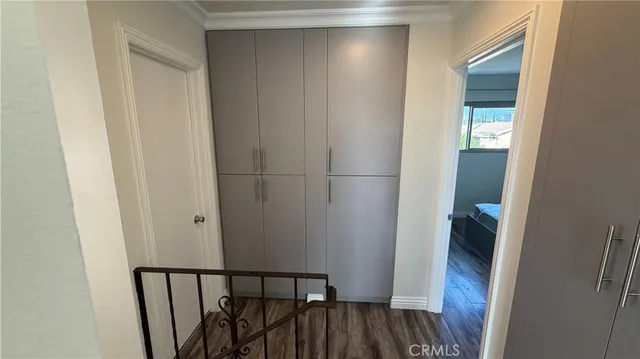 a spacious bathroom with a double vanity sink and mirror