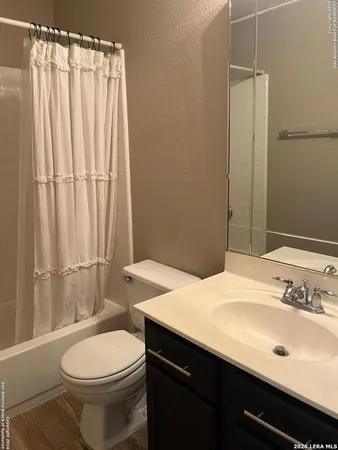 an empty room with a empty space and a window