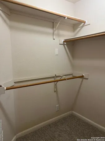 a view of a room with racks on the wall