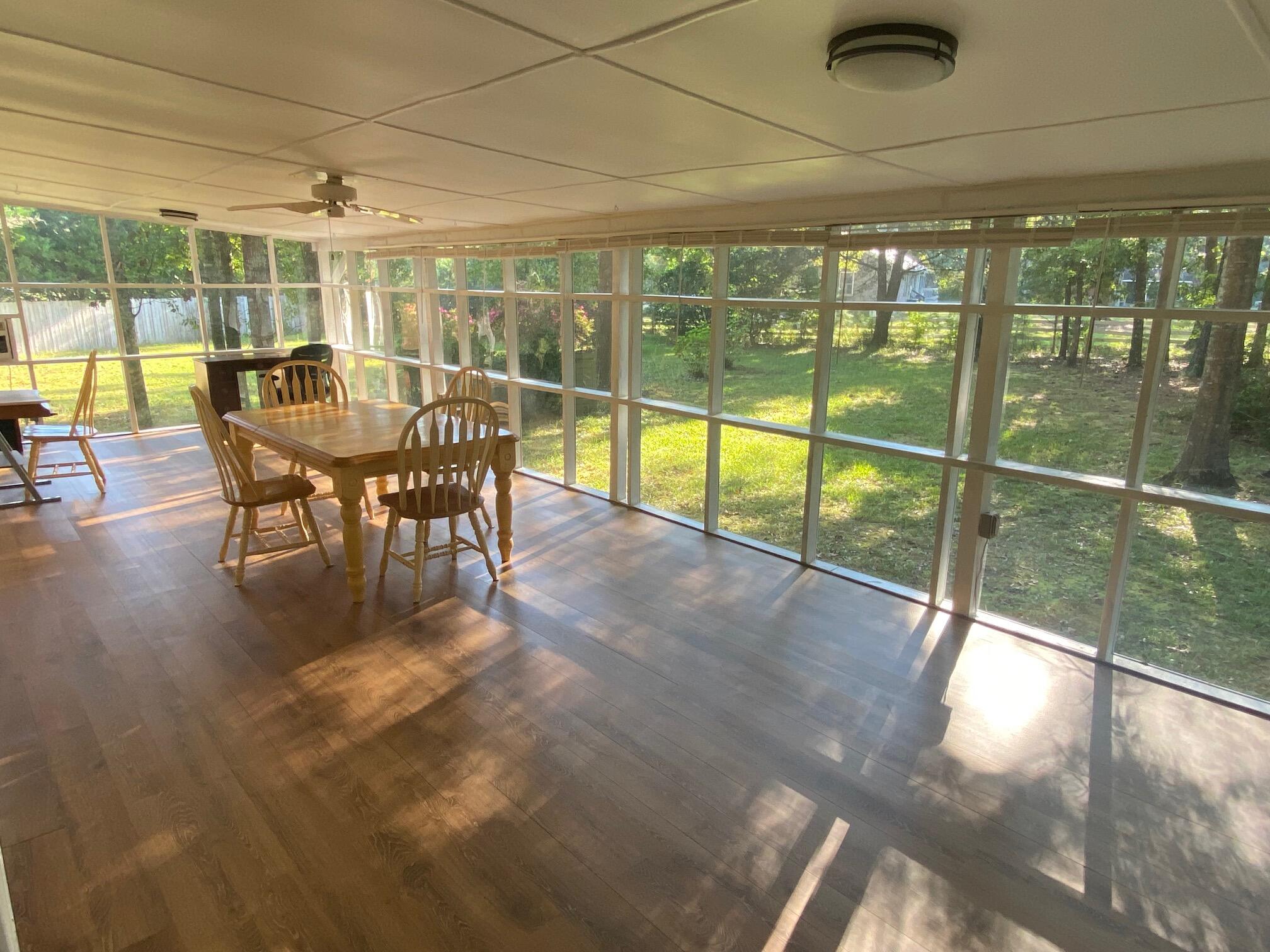 7271 George Washington Lane Awendaw, SC 29429 - Photo 3 of 24 Enclosed porch