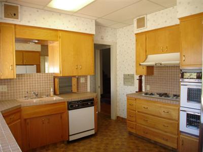 317 Fairview Road Ojai, CA 93023 - Photo 11 of 11 a kitchen that has a sink and a stove in it