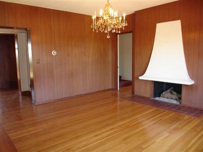 317 Fairview Road Ojai, CA 93023 - Photo 6 of 11 a view of a room with wooden floor and chandelier