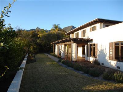 317 Fairview Road Ojai, CA 93023 - Photo 7 of 11 a front view of a house with a yard