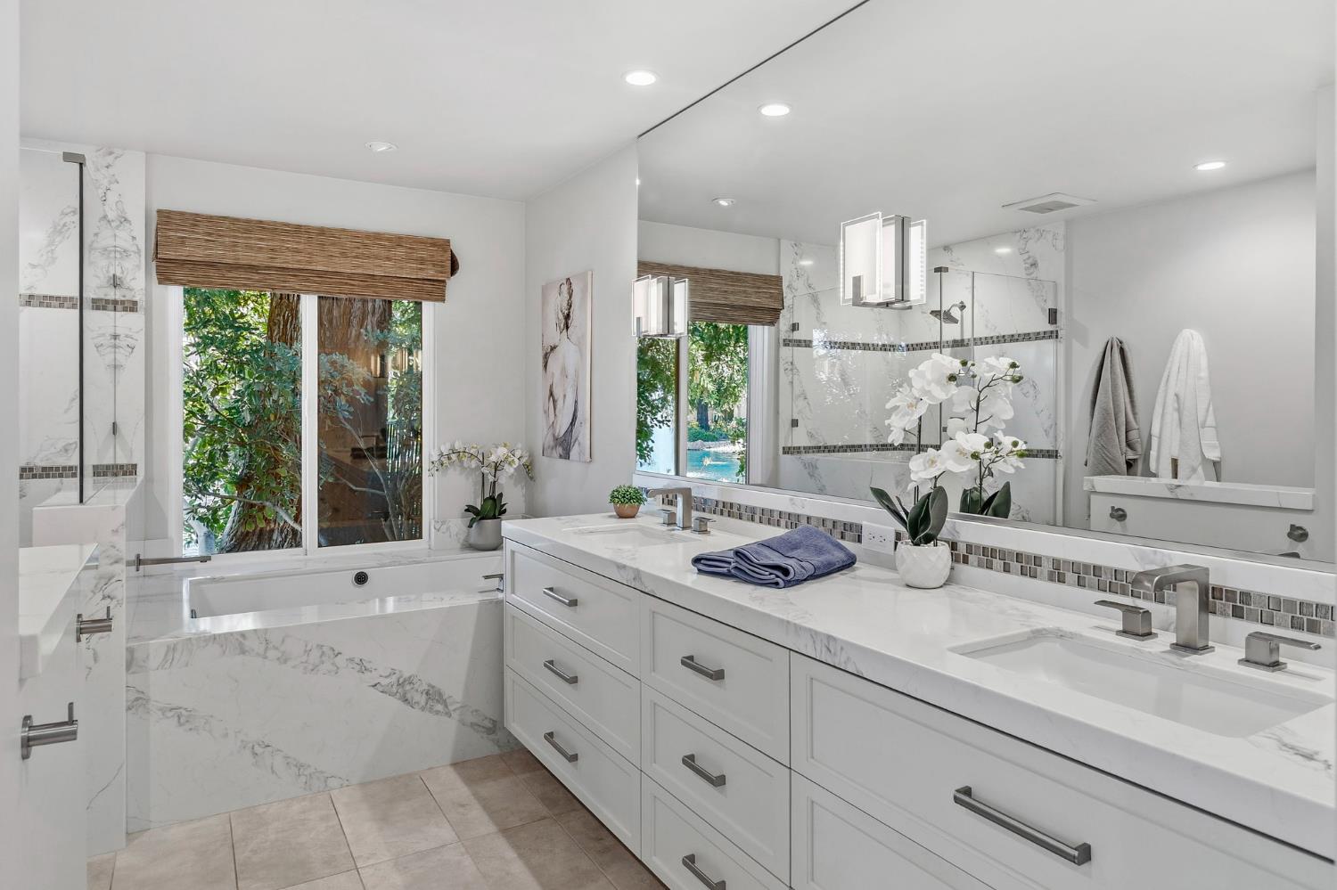 1013 Copper Lake Court Modesto, CA 95355 - Photo 20 of 66 a bathroom with a granite countertop sink mirror and window