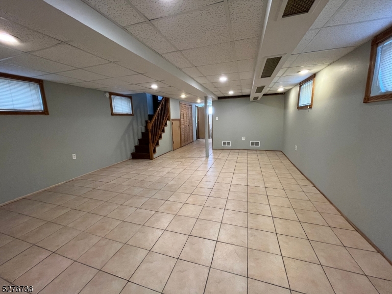 364 Chestnut Street Kearny, NJ 07032 - Photo 16 of 22 a view of an empty room and a window