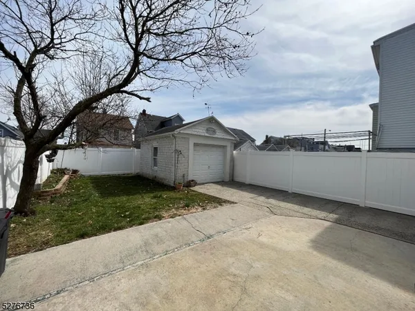 a house view with a garden space