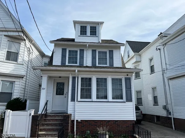 a front view of a house with a balcony