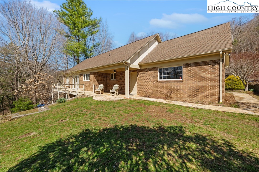 304 Glendale Drive Boone, NC 28607 - Photo 9 of 50 a front view of a house with garden